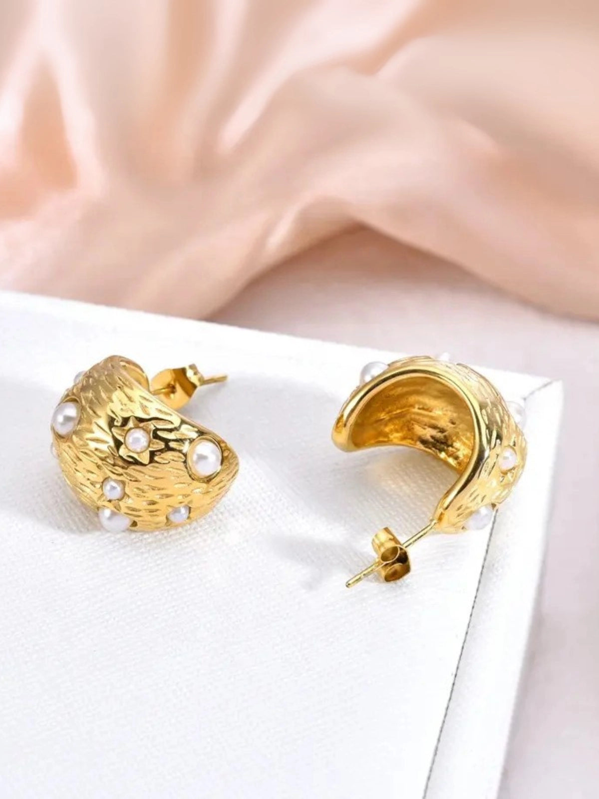 Close‑up of Aelina Earring by Shine With Me showing gold‑plated finish, stainless steel base, pearl accent and cubic zirconia craftsmanship