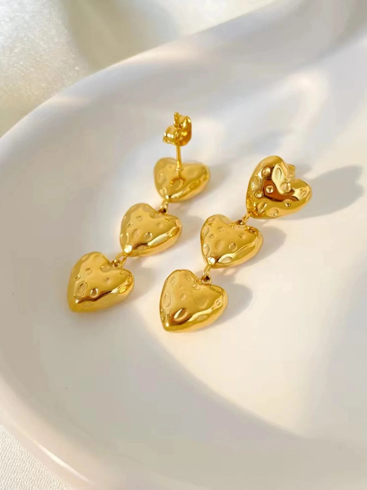 Ashley Heart Earring side angle — 18K gold-plated stainless steel heart-shape (35 mm), by Shine With Me, detailed profile
