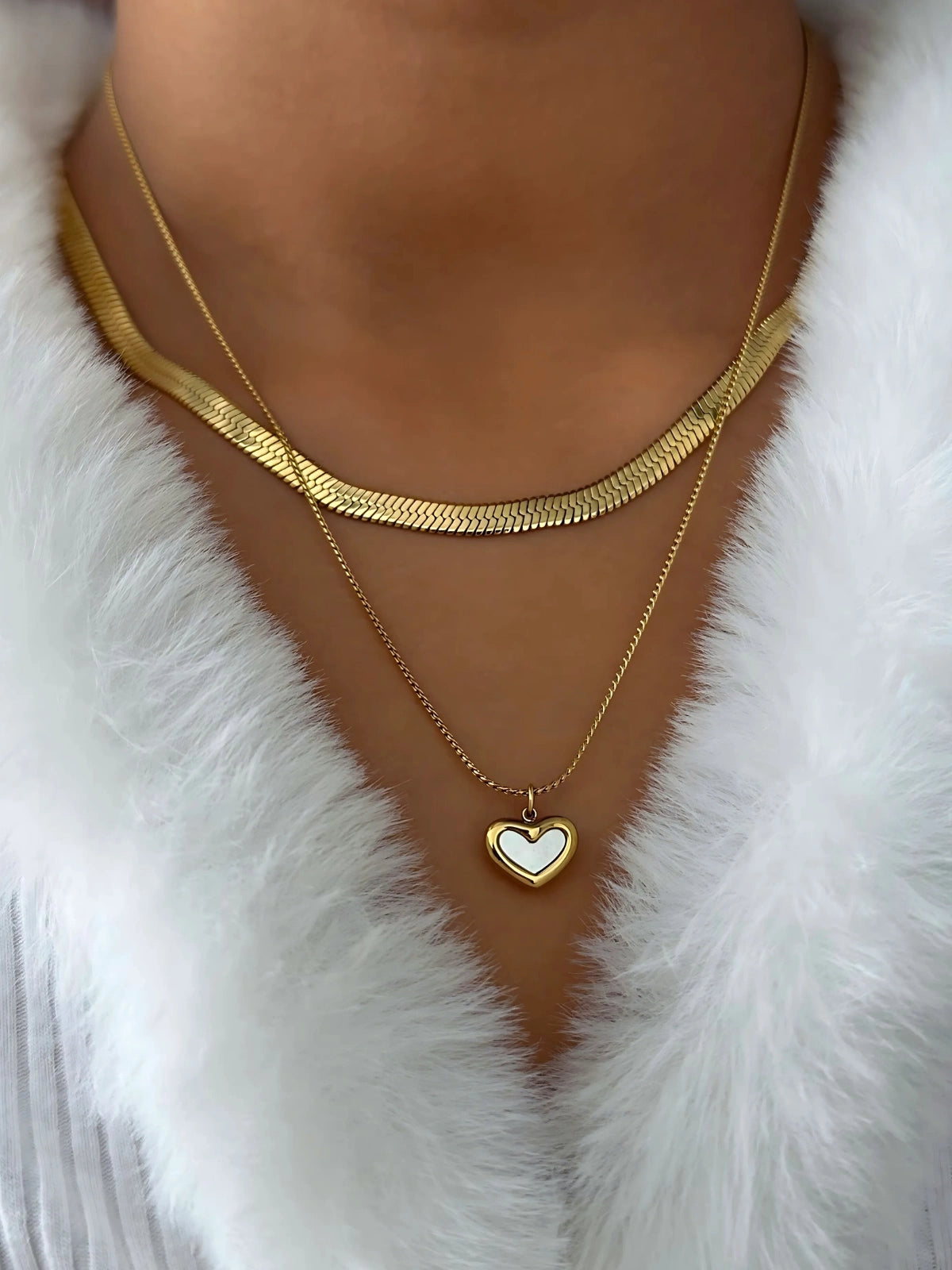 Bella Heart Necklace worn on neck — 18K gold-plated stainless steel chain (40 cm + 5 cm) with heart pendant and cubic zirconia by Shine With Me.