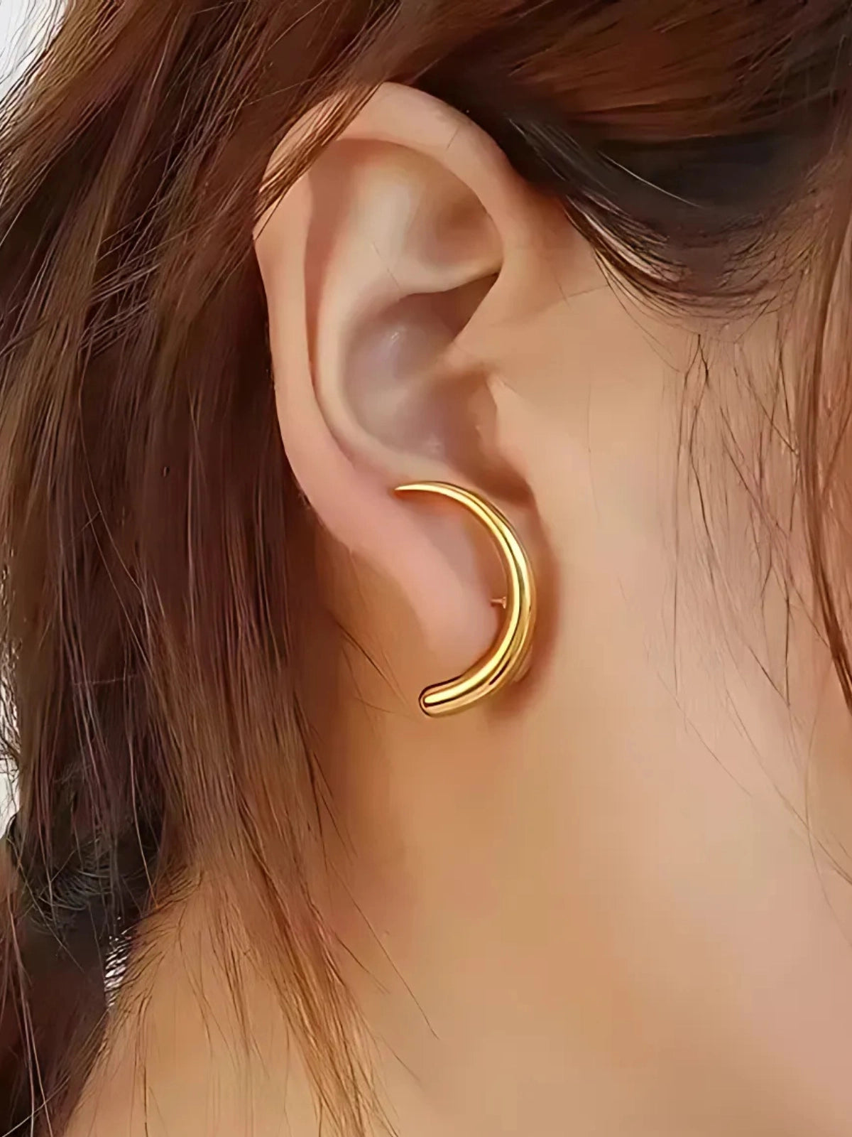 Celora Earring worn on ear — 18K gold‑plated stainless steel earrings by Shine With Me, styled look