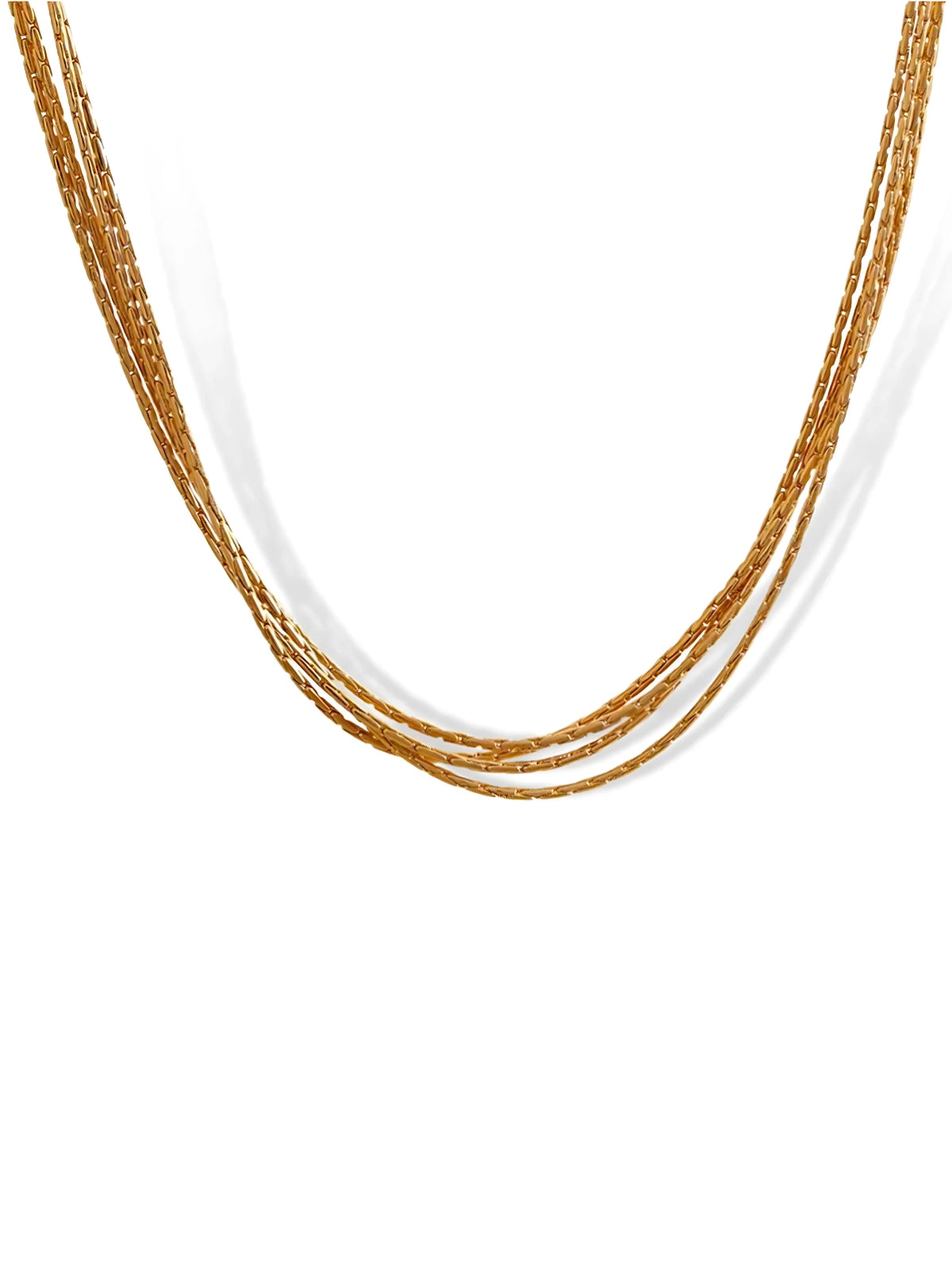Elizelle Chain – Front View-Gold necklace with multiple strands on a white background