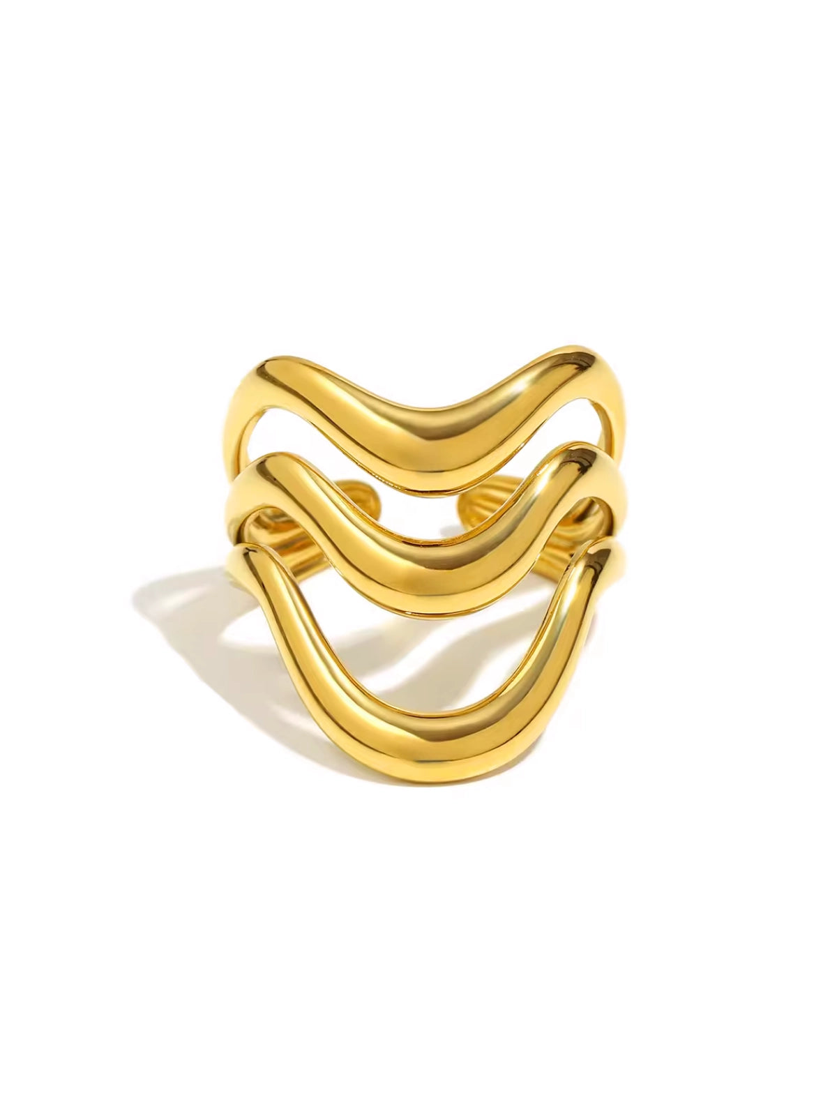 Estela Ring – Front View-Gold ring with wavy design on a white background