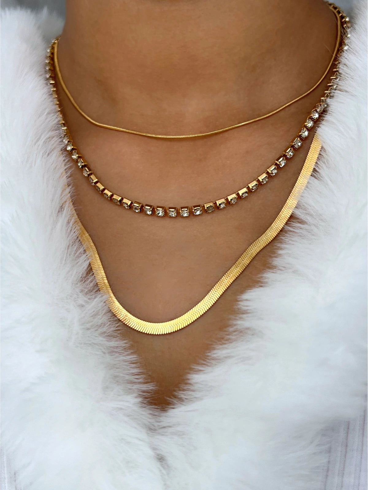 Luna Three Layer Necklace worn on neck — 18K gold-plated stainless steel with cubic zirconia by Shine With Me, styled layered look.
