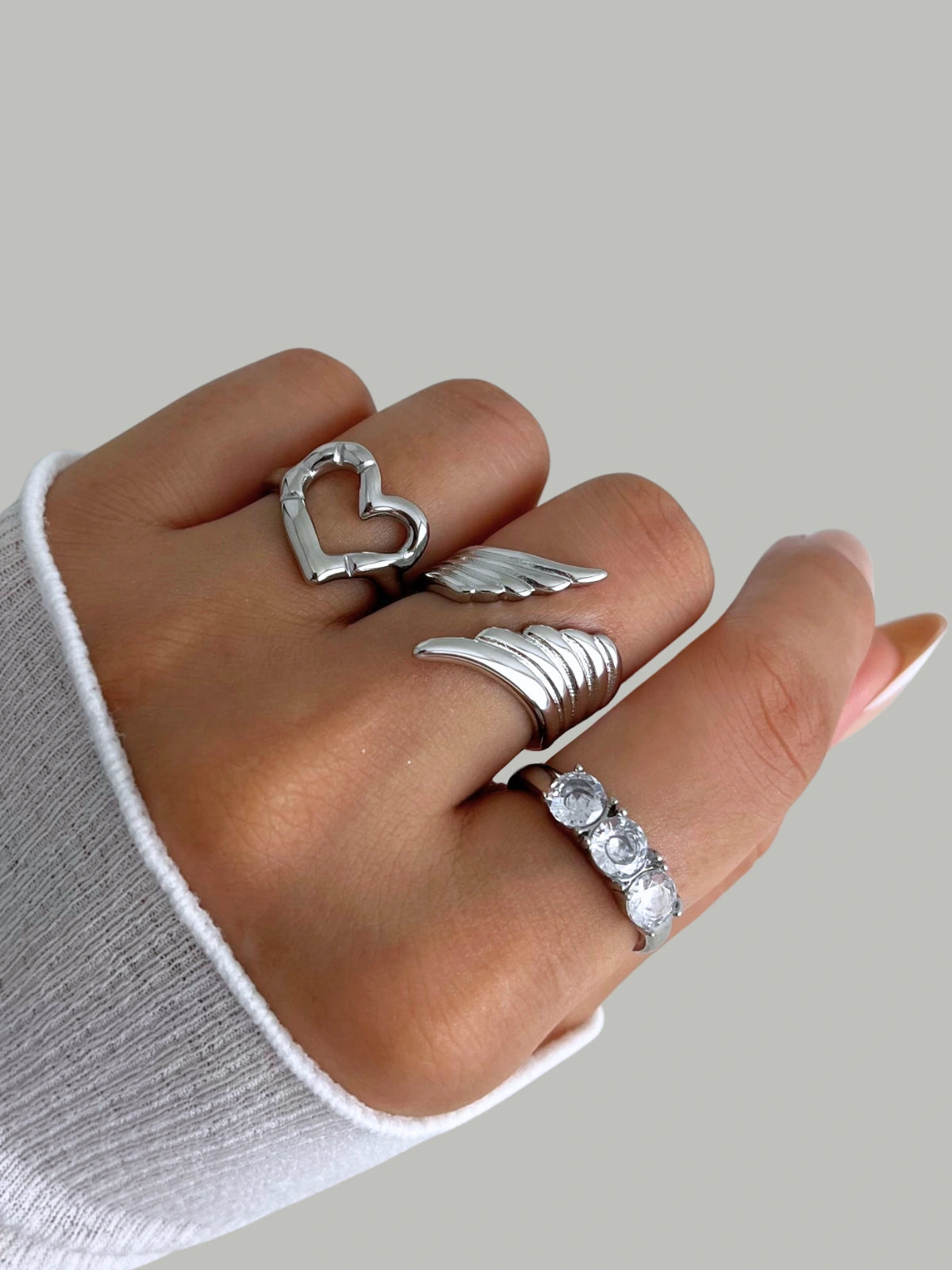 Luxe Ring worn on finger — 18K gold‑plated stainless steel by Shine With Me, showing elegant design in use.