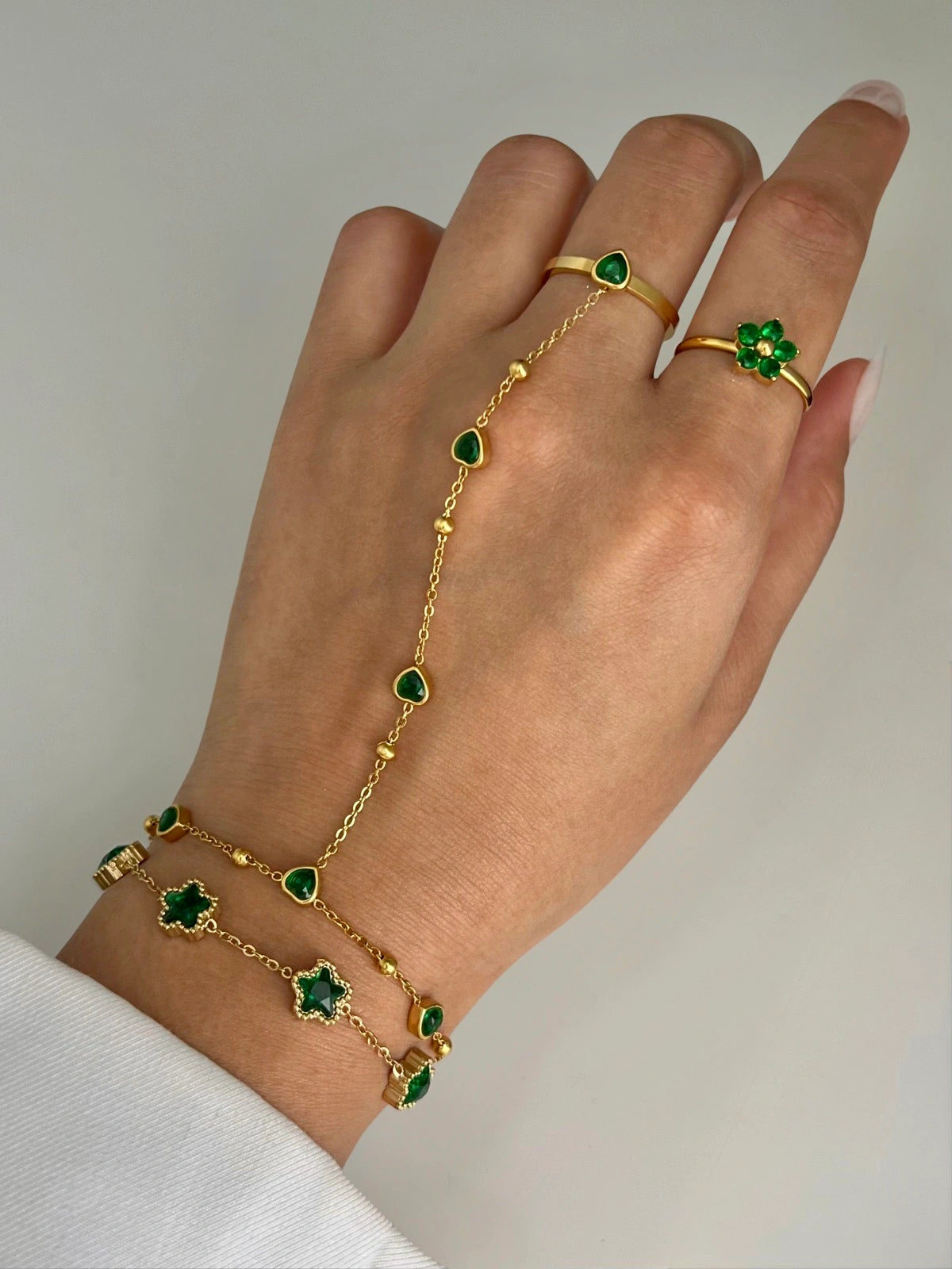 Close-up detail of Miranda Hand Harness by Shine With Me, gold-plated chain, hand-harness design, fine craftsmanship.