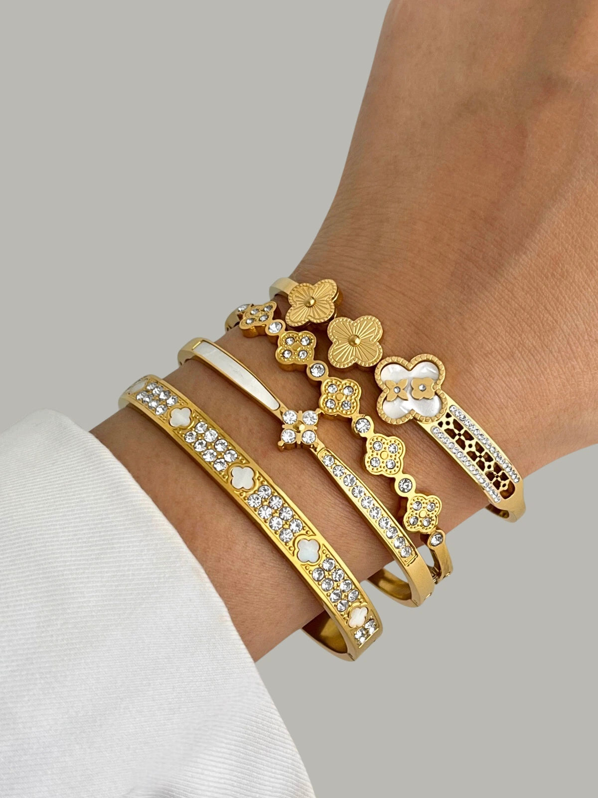 Olenna Bangle styled with other jewellery by Shine With Me — gold-plated bracelet layering and subtle sophisticated shine