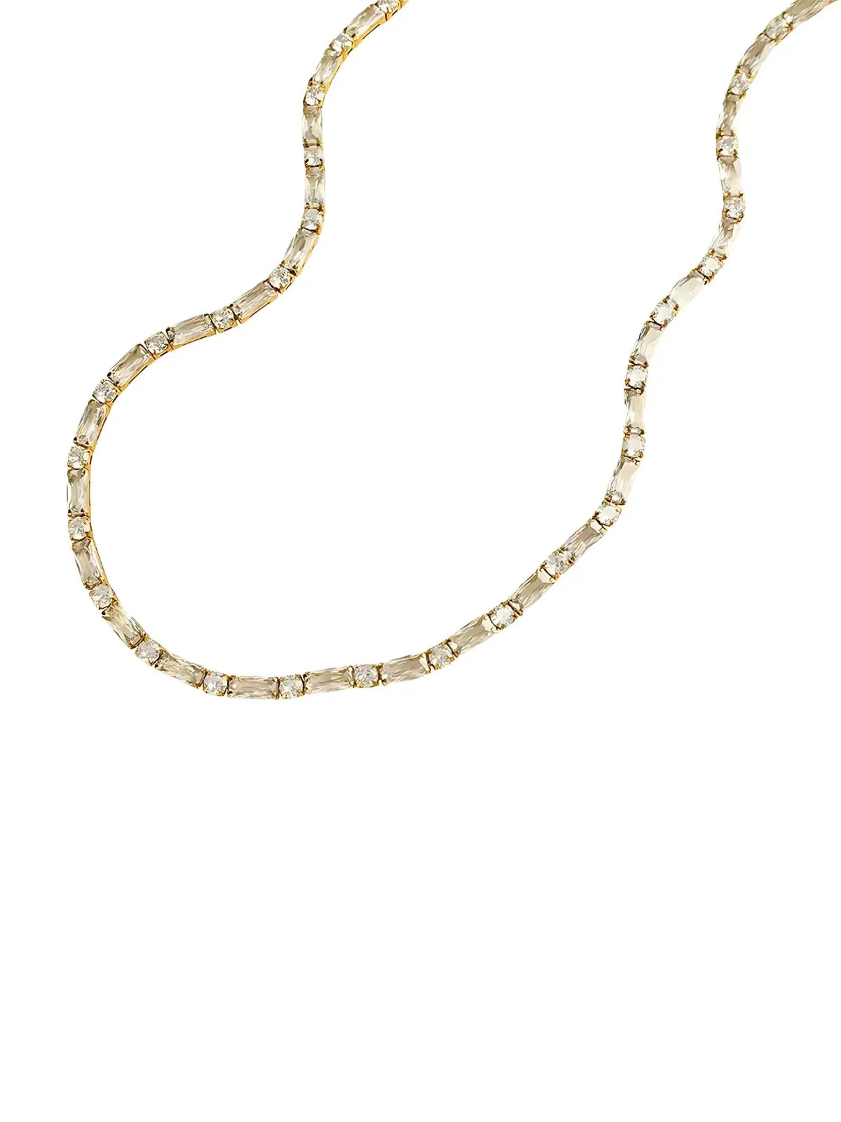 Sansa Necklace & Bracelet Gold necklace with small beads on a white background