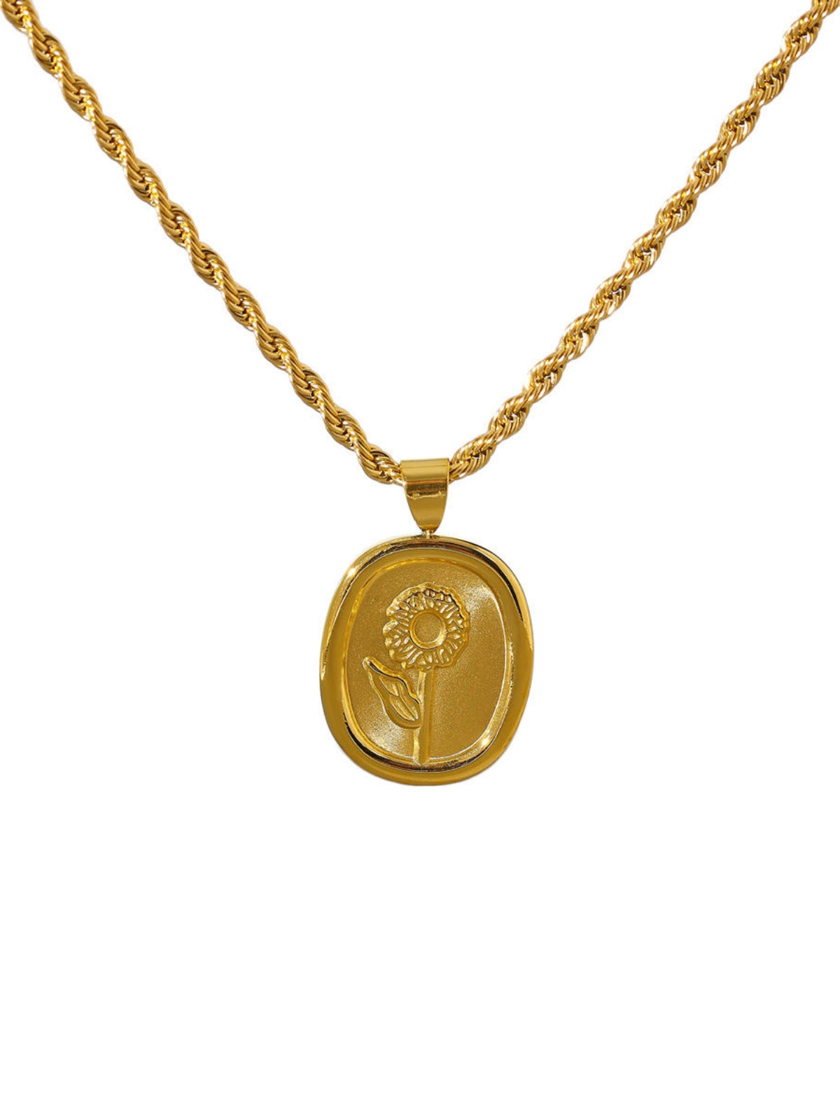 Sawana Necklace – Front View-Gold necklace with a pendant on a white background