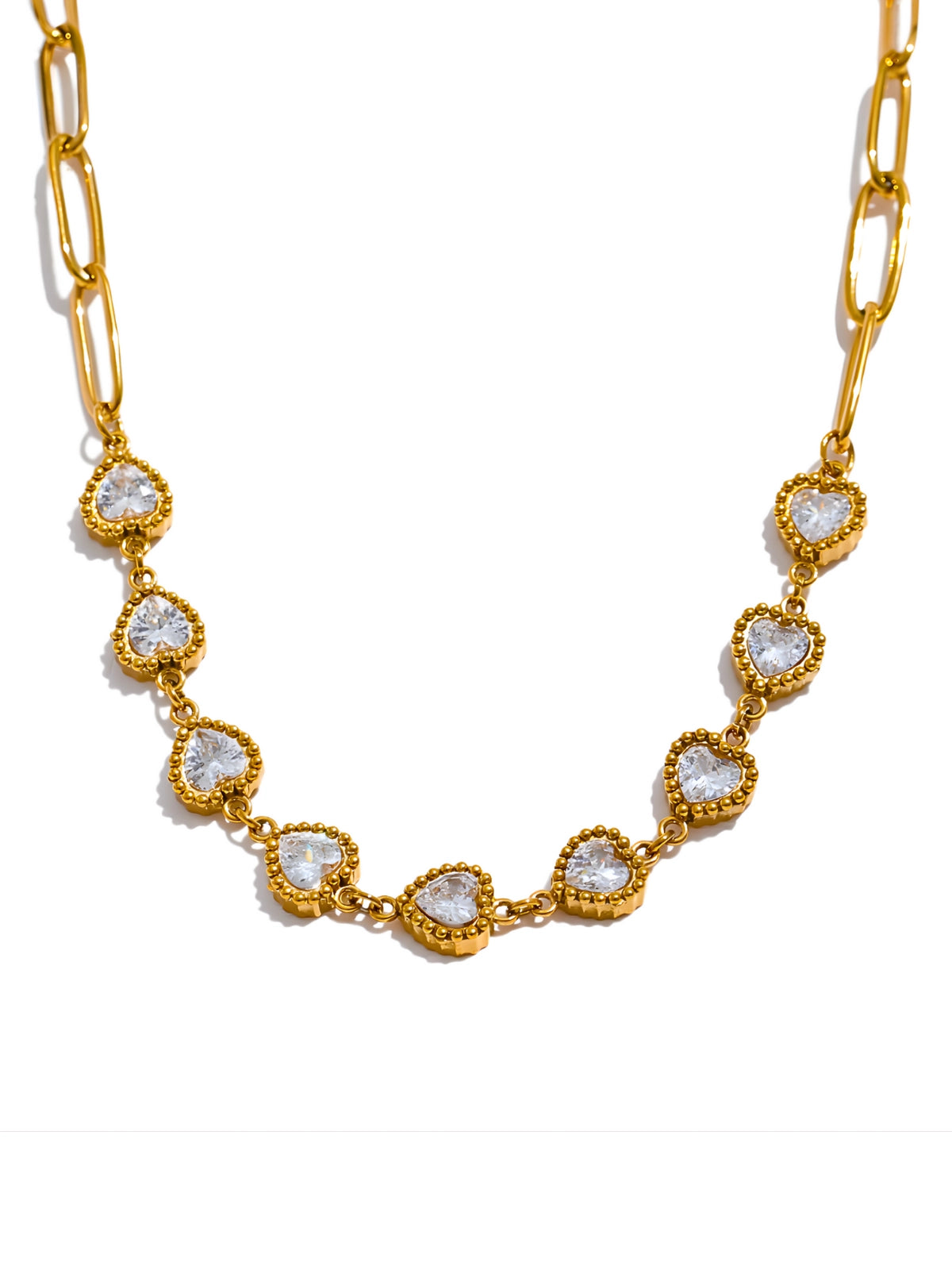 Velina Heart Necklace – Front View-Gold necklace with heart-shaped gemstones on a white background