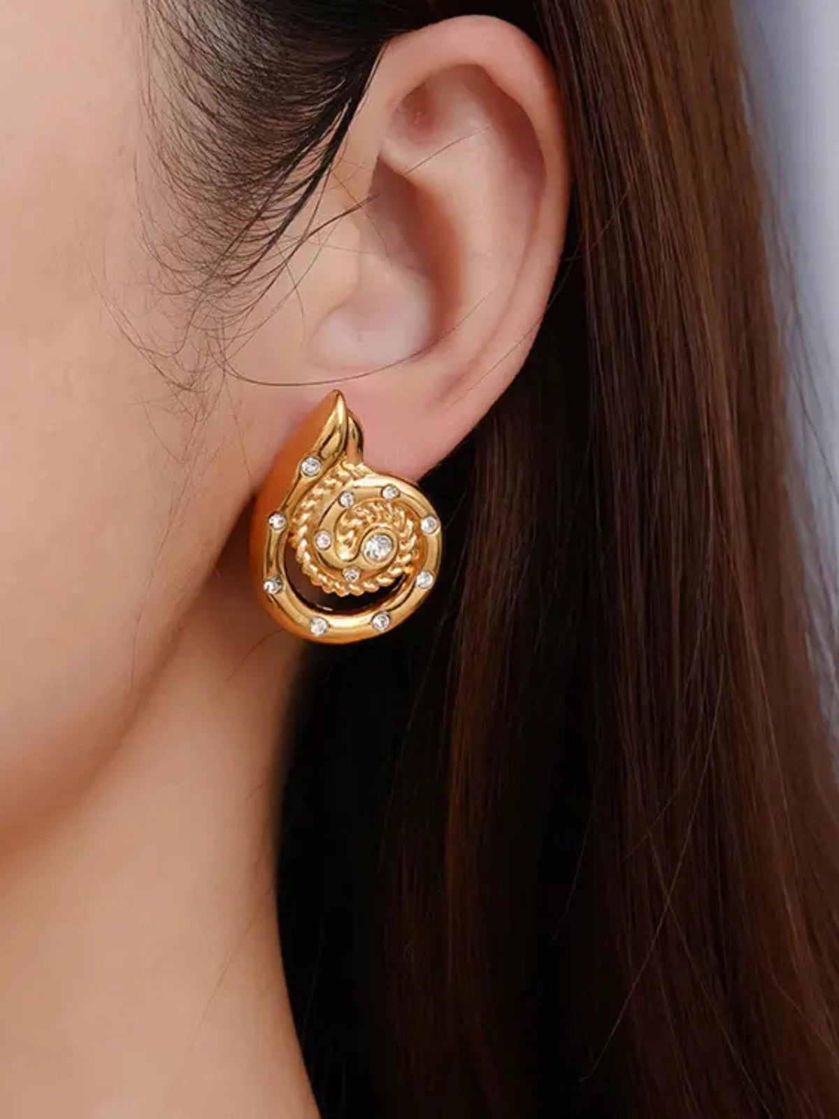Adele Earring worn on ear — 18K gold‑plated stainless steel (16 g) by Shine With Me, styled look.