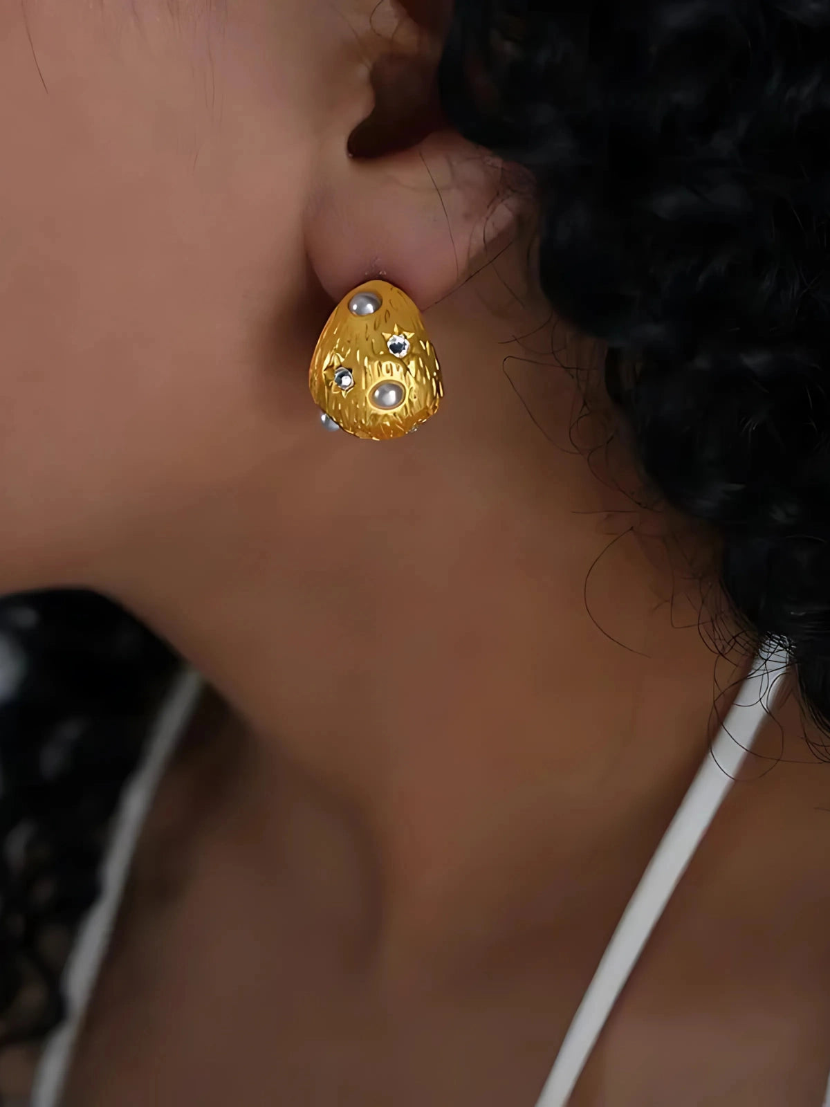 Aelina Earring worn on ear — 18K gold‑plated stainless steel, size 20 mm × 15 mm, weight 13.5 g, by Shine With Me, styled look.