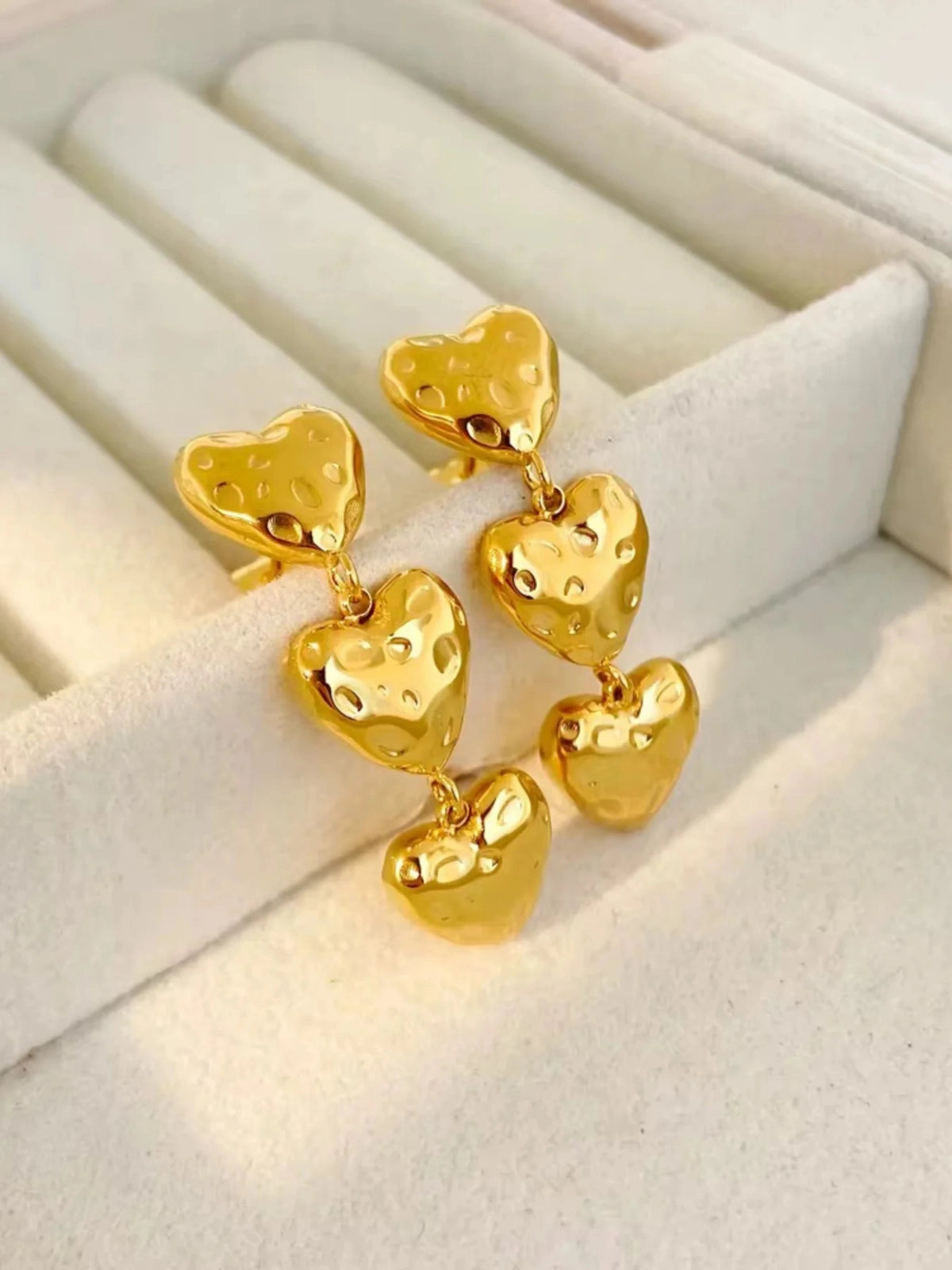 Close-up of Ashley Heart Earring by Shine With Me showing gold-plated finish, stainless steel base and craftsmanship (13 g total weight)