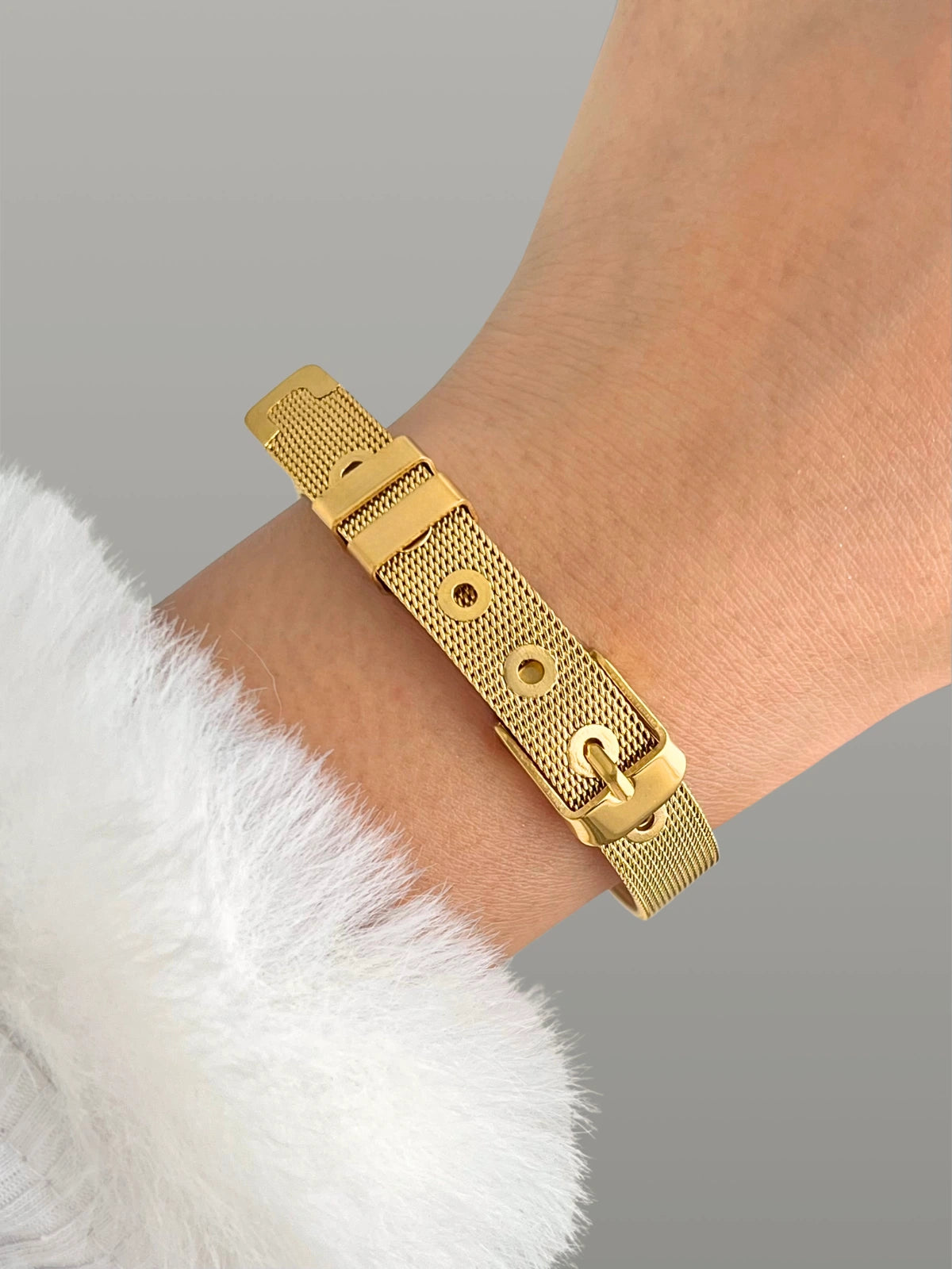 Belt Bracelet worn on wrist — gold-plated stainless steel 21 cm size bracelet by Shine With Me, modern belt-style elegance.