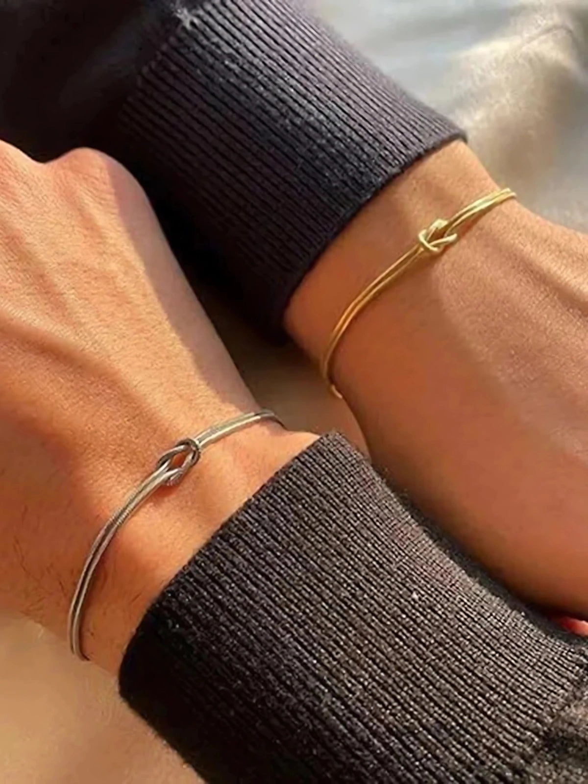 Bound Forever Bracelet worn on wrist — 18K gold-plated stainless steel (17 cm + 6 cm) by Shine With Me, styled look.