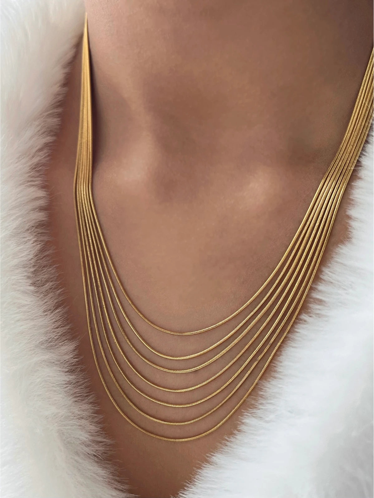 Bound Layered Chain worn around neck — 18K gold-plated stainless steel layered necklace (38-44 cm + 5 cm extender) by Shine With Me styled look.