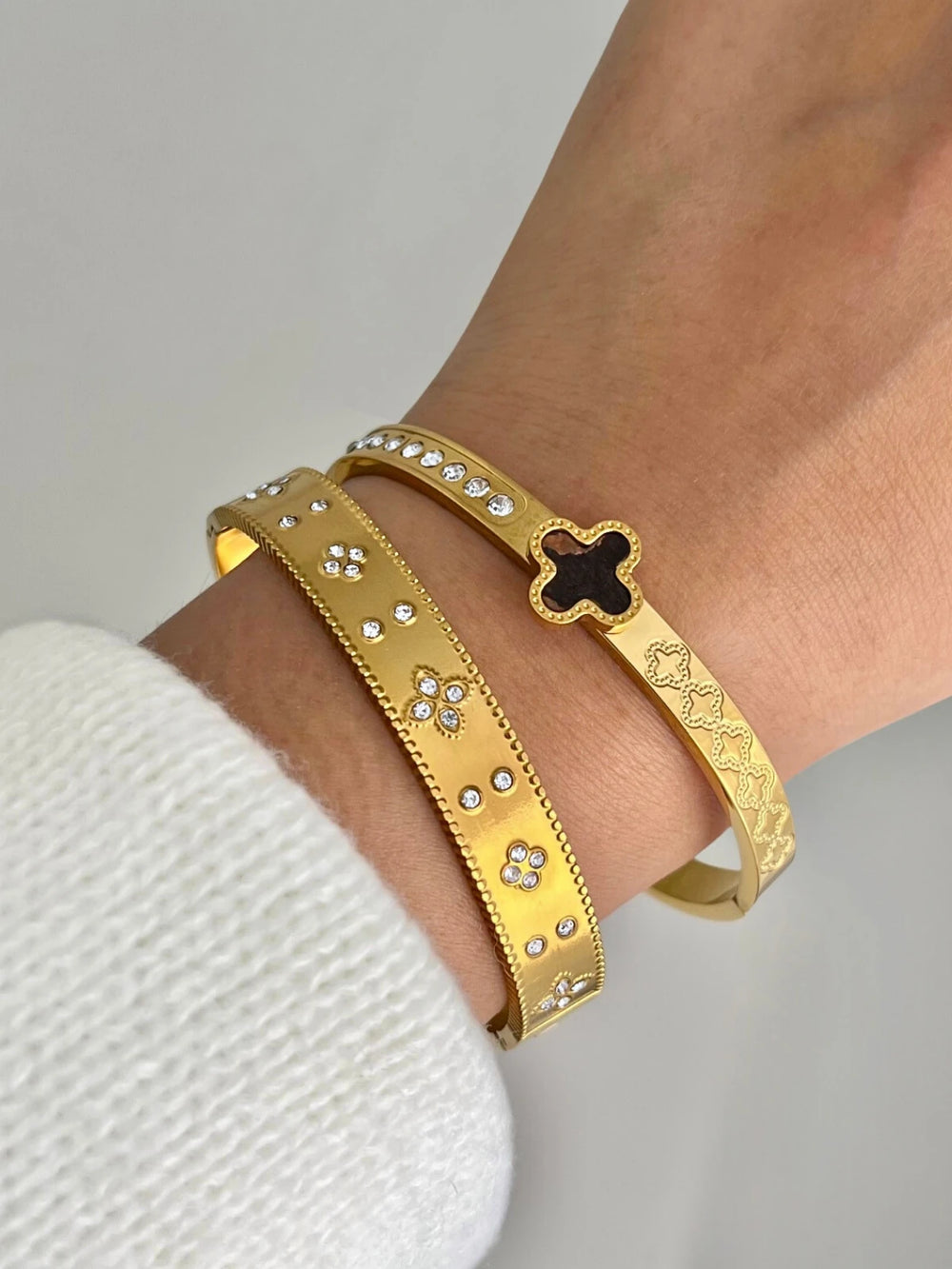 Clara Bangle worn on wrist — gold-plated stainless steel bracelet by Shine With Me, elegant daily wear with cubic zirconia accents.