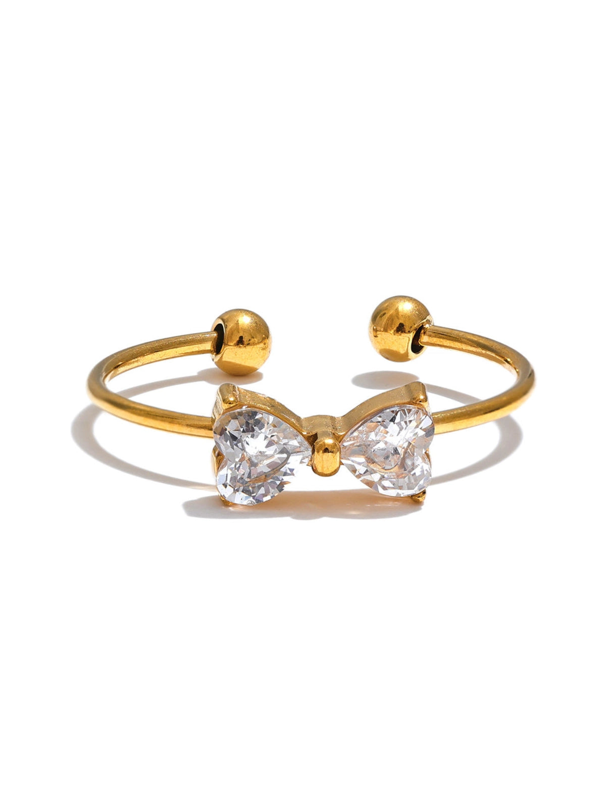 Dress Dial Ring – Front View-Gold bracelet with heart-shaped crystals on a white background