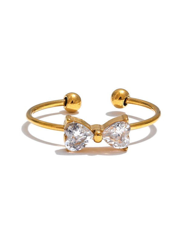 Dress Dial Ring – Front View-Gold bracelet with heart-shaped crystals on a white background