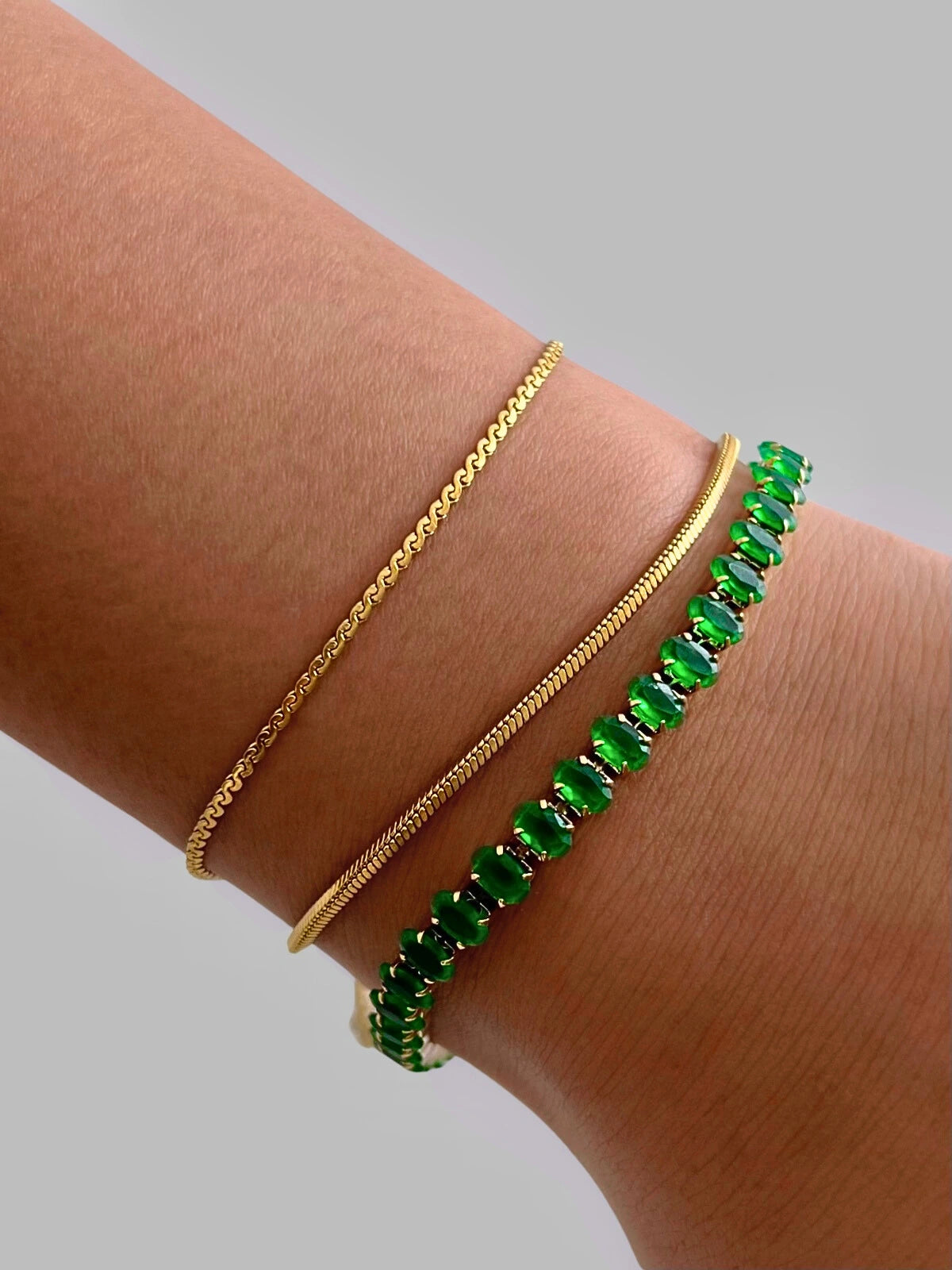 Dua Layered Bracelet worn on wrist — 18K gold-plated stainless steel bracelet (size 16 cm + 5 cm) by Shine With Me, styled look in Gold variant.