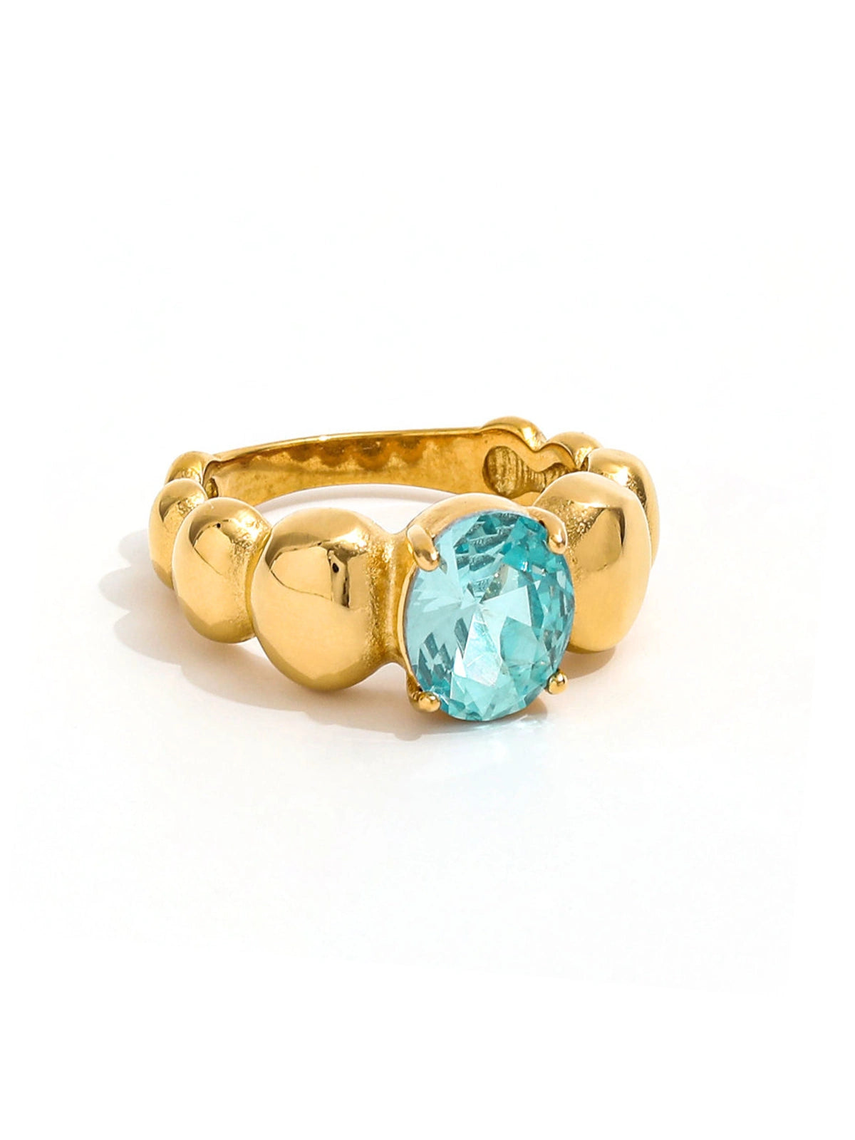 Fabiana Ring – Front View-Gold ring with a blue gemstone on a white background