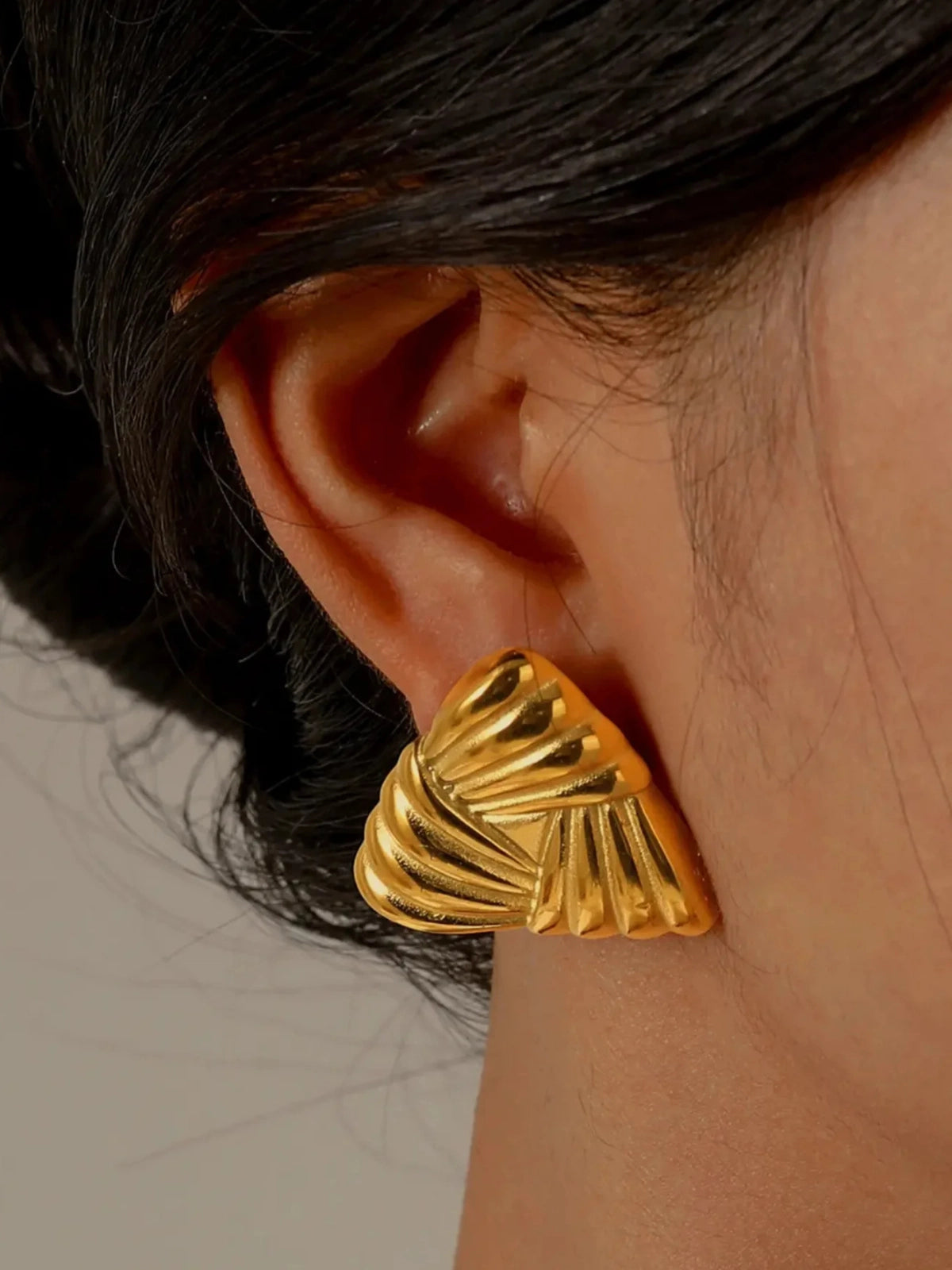 Falisha Earring worn on ear — 18K gold‑plated stainless steel by Shine With Me in Gold variant, styled for everyday chic