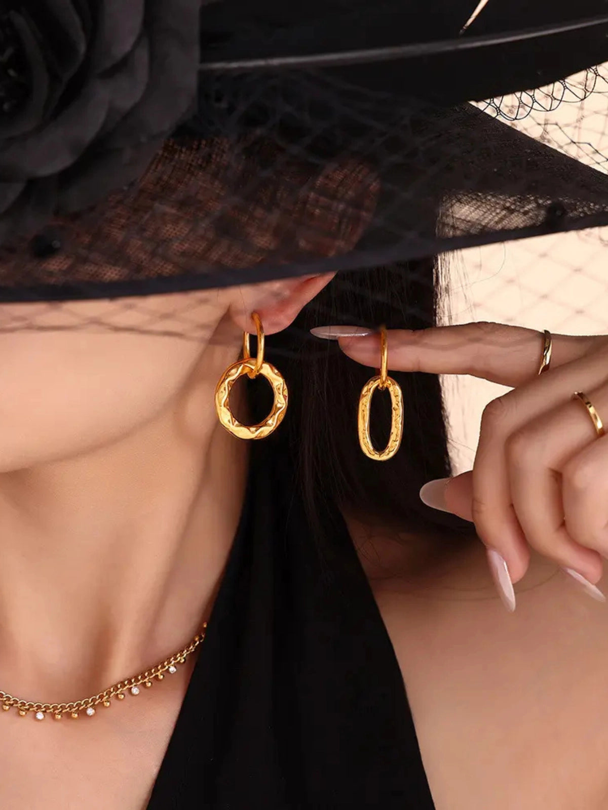 Forever Us Earrings worn on ear — 18K gold‑plated stainless steel earrings (38 mm, 11g) by Shine With Me, styled look