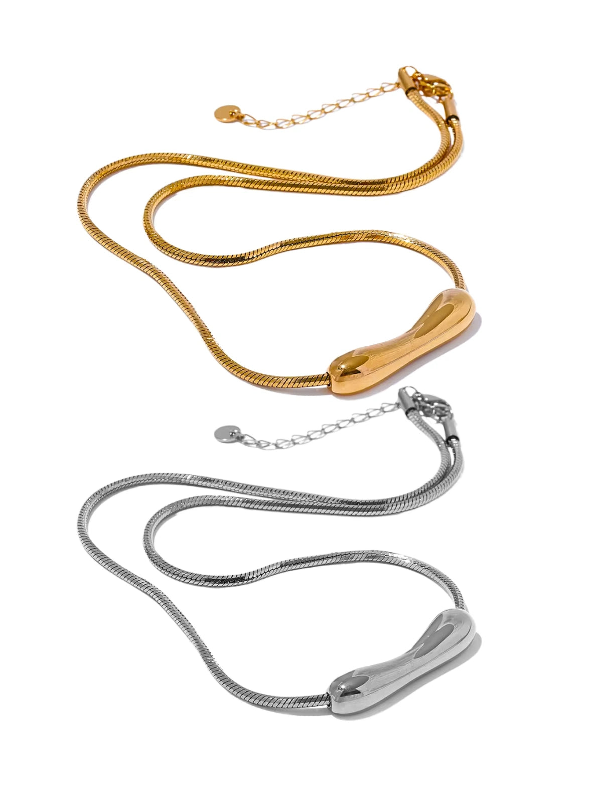 Halia Necklace – Colour Variant View-Gold and silver necklaces on a white background