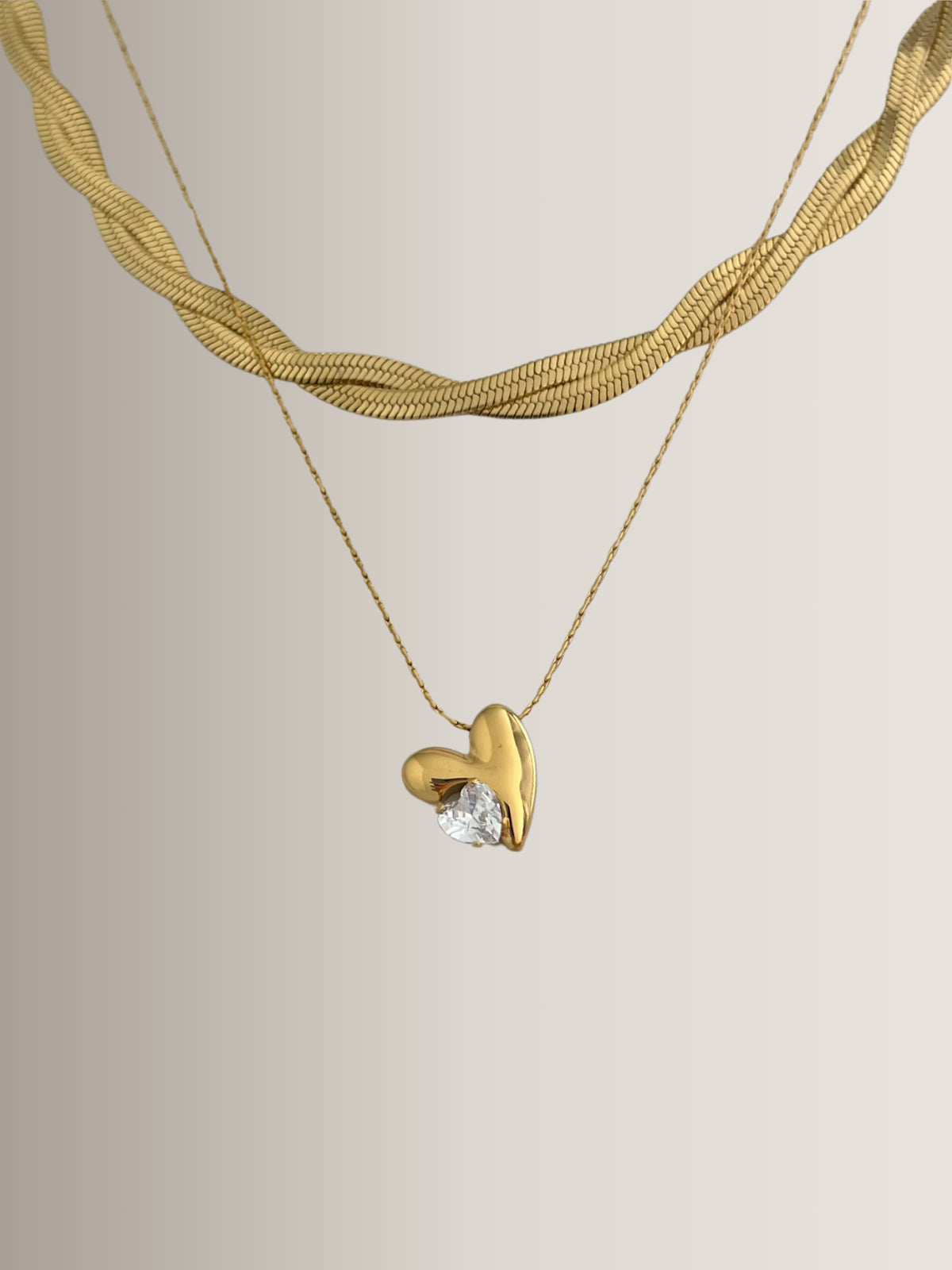 Have My Heart Necklace – Close-Up Detail-Gold heart-shaped necklace with a diamond on a light gray background