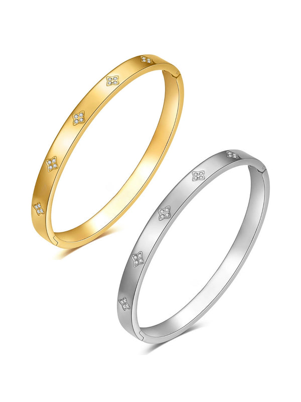Lumi CLOVER BANGLE – Front View, Gold and silver bangles with small diamond-like stones on a white background