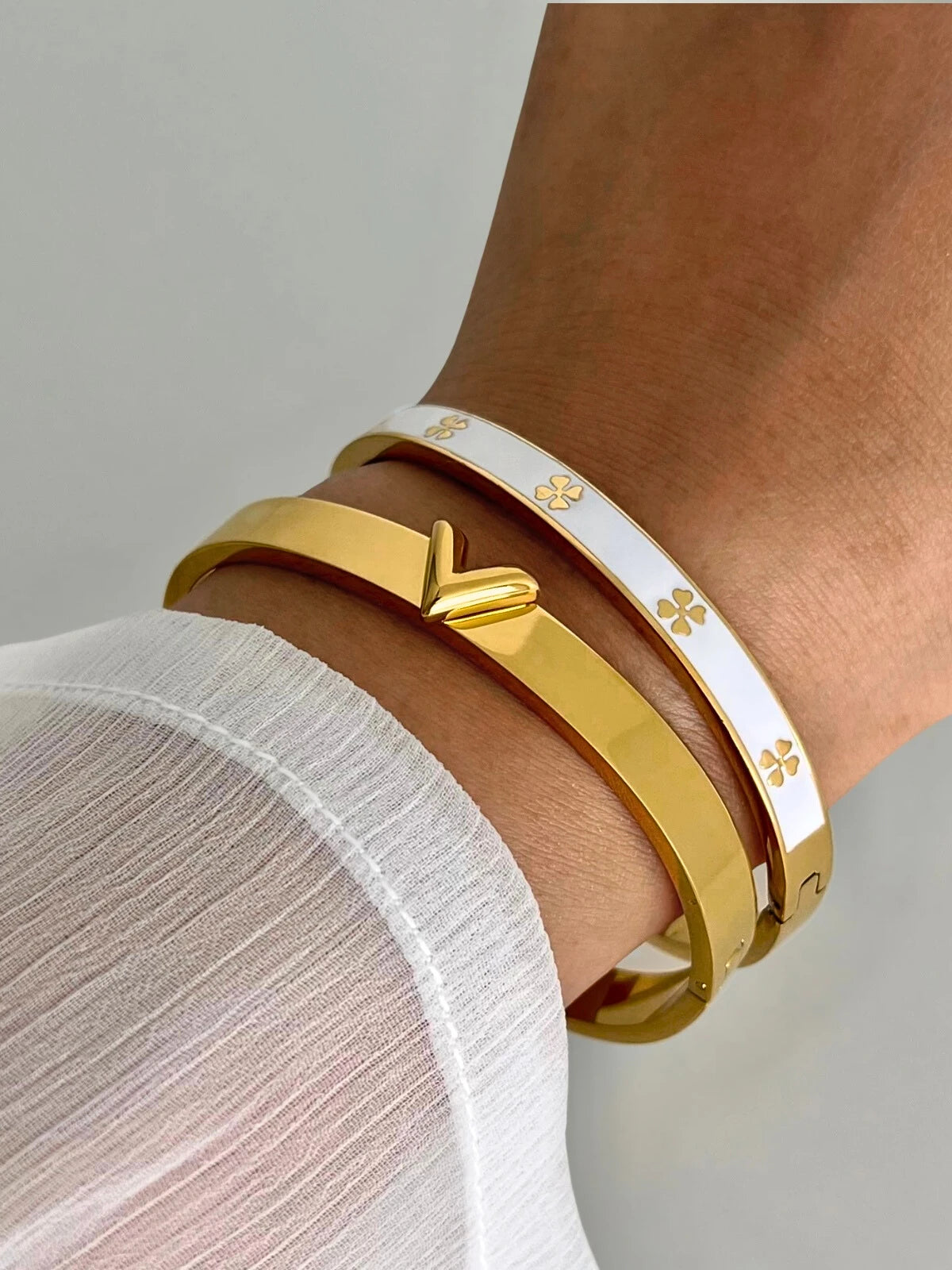 Lunissa Bangle worn on wrist — 18K gold-plated stainless steel by Shine With Me, modern elegance for daily wear.
