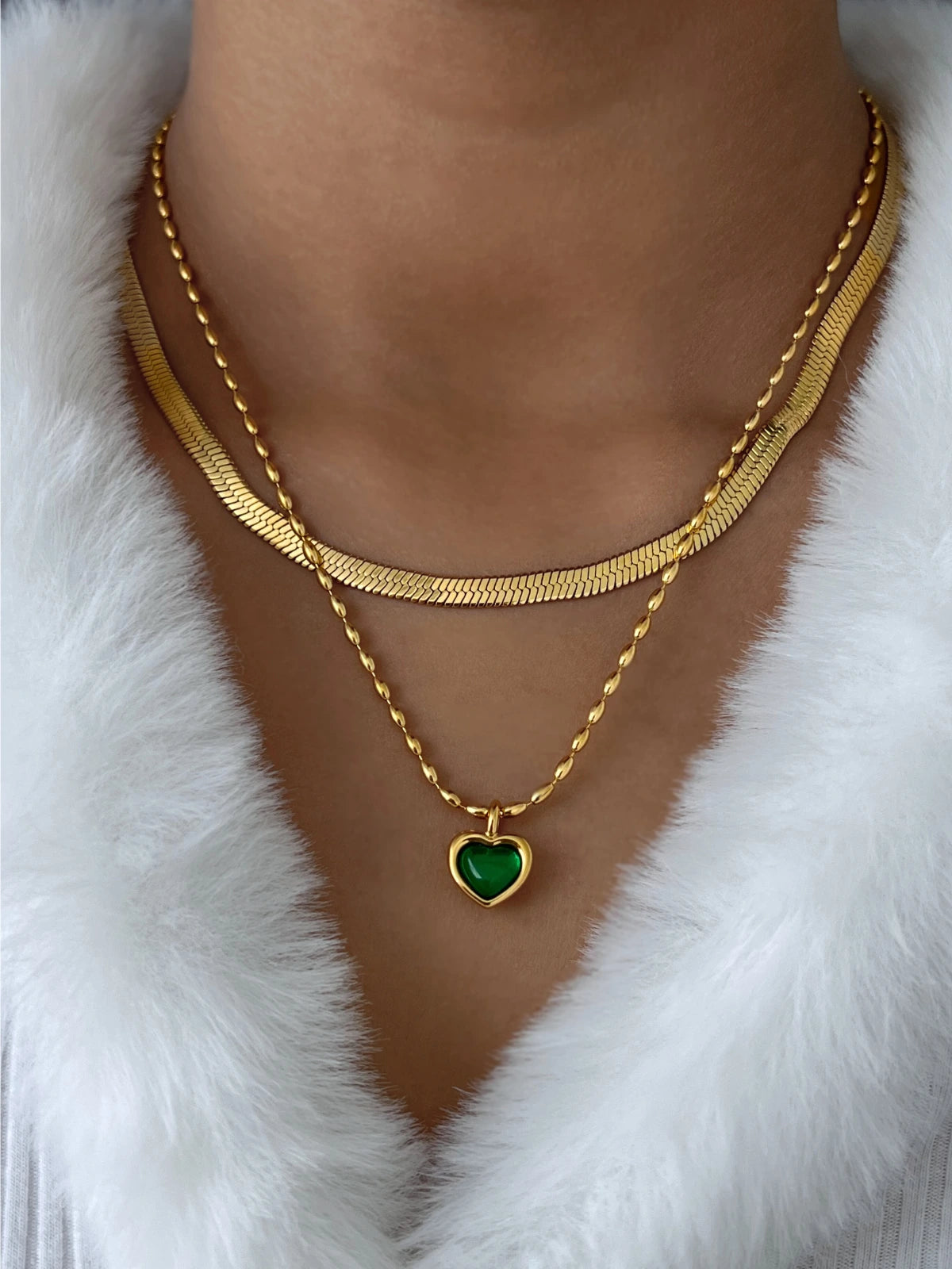 Lyra Heart Necklace worn around neck — 18K gold-plated stainless steel, chain 41 cm + 6 cm by Shine With Me, styled look for everyday elegance.
