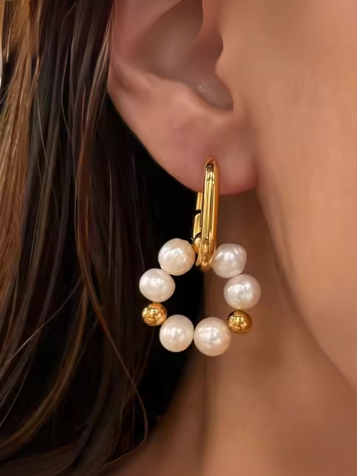 Pearl Dream Hoop worn on ear — 18K gold‑plated stainless steel hoop (30 mm × 17 mm) with freshwater pearl by Shine With Me, styled look.