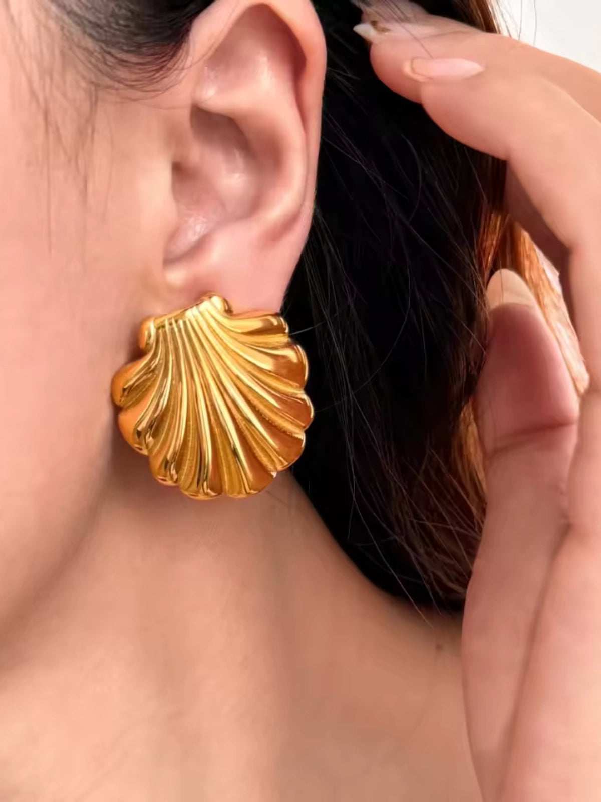 Shella Earrings worn on ear — 18K gold‑plated stainless steel (30 mm) by Shine With Me, styled look in Gold variant.