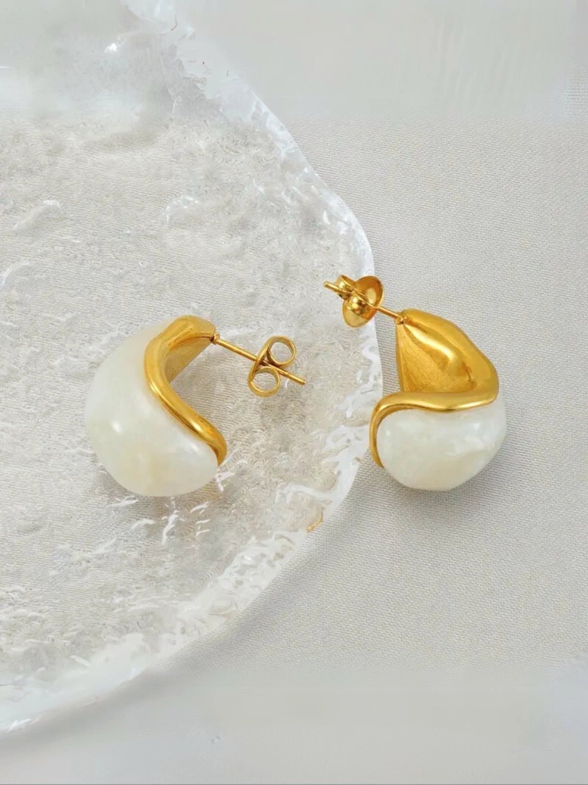 Close‑up of Solana Earring by Shine With Me showing 18K gold‑plated finish, stainless steel base and texture