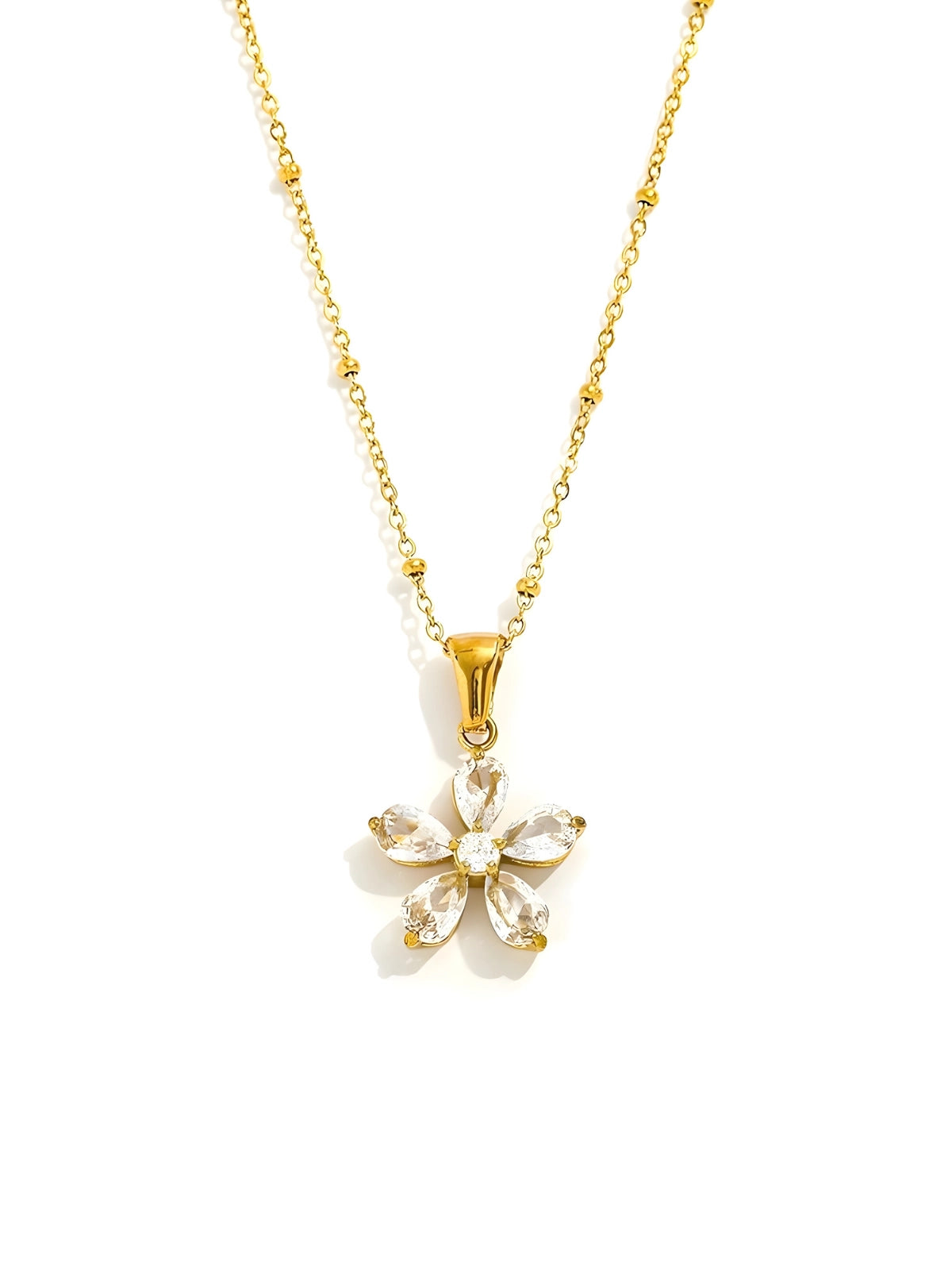 Solea Necklace – Front View-Gold necklace with a floral pendant on a white background