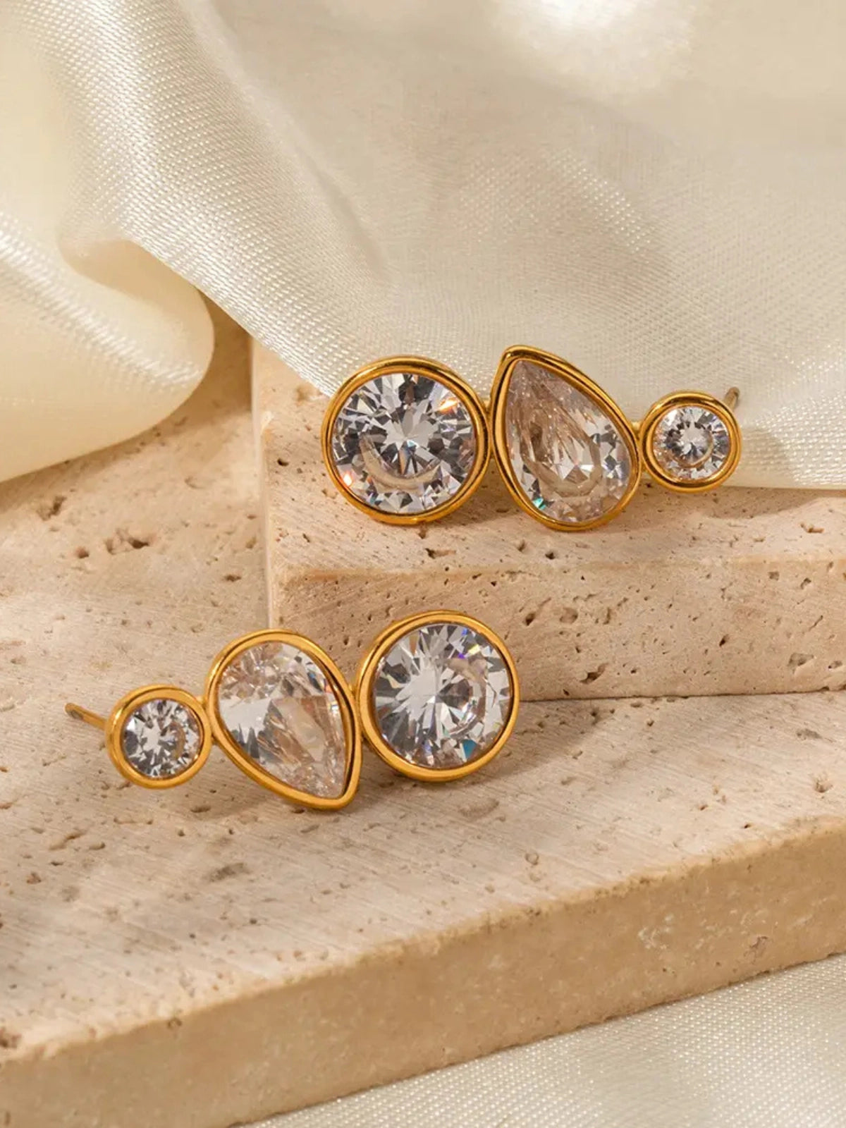 Syndra Earring by Shine With Me shown from side/angle — luxury 18K gold-plated stainless steel design, elegant profile