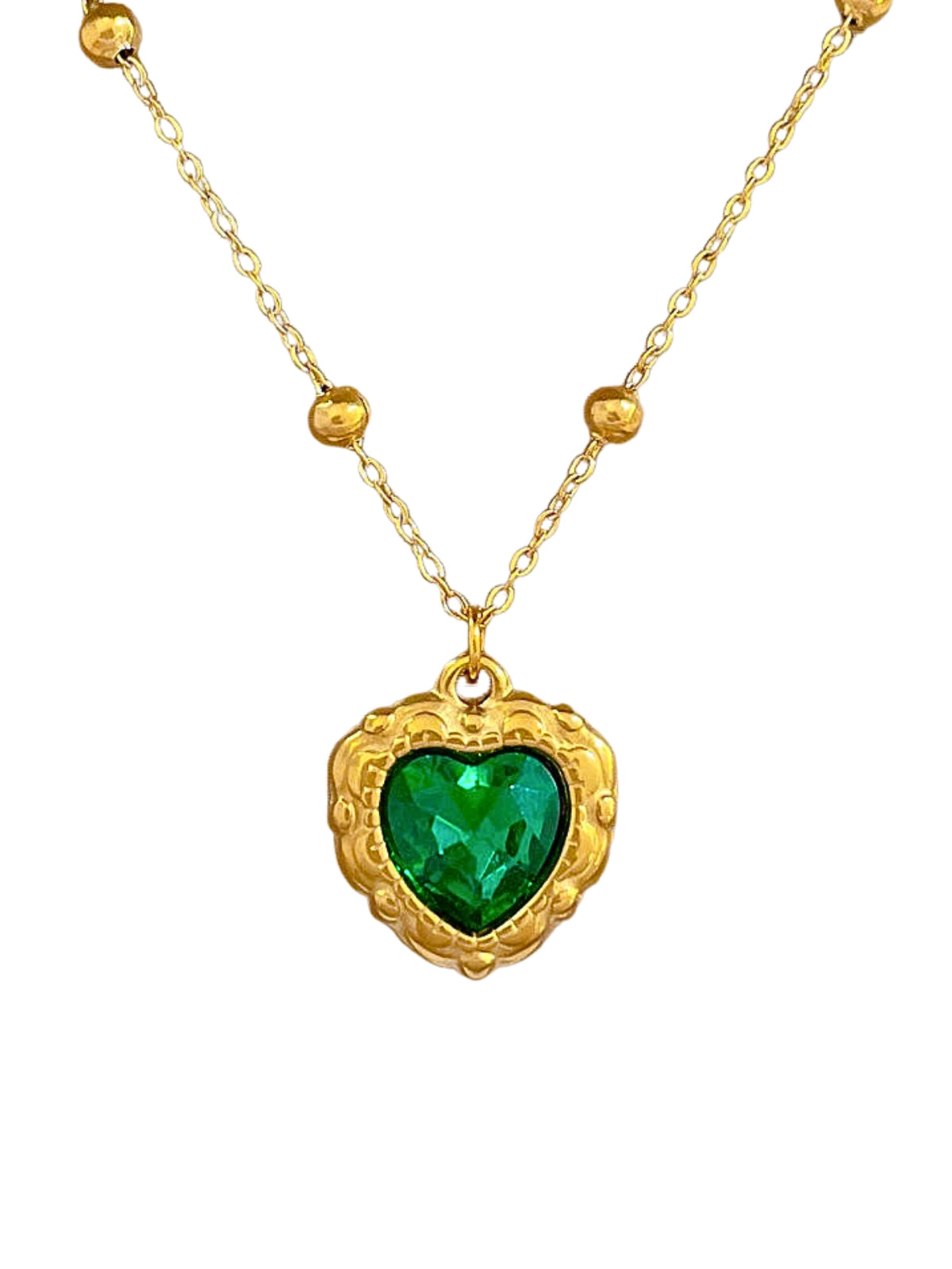 Zafira Necklace – Front View-Gold necklace with a heart-shaped green gemstone pendant on a white background