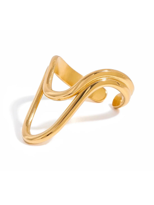 ameline-ring-front-view-shine-with-me.Gold ring with a wavy design on a white background
